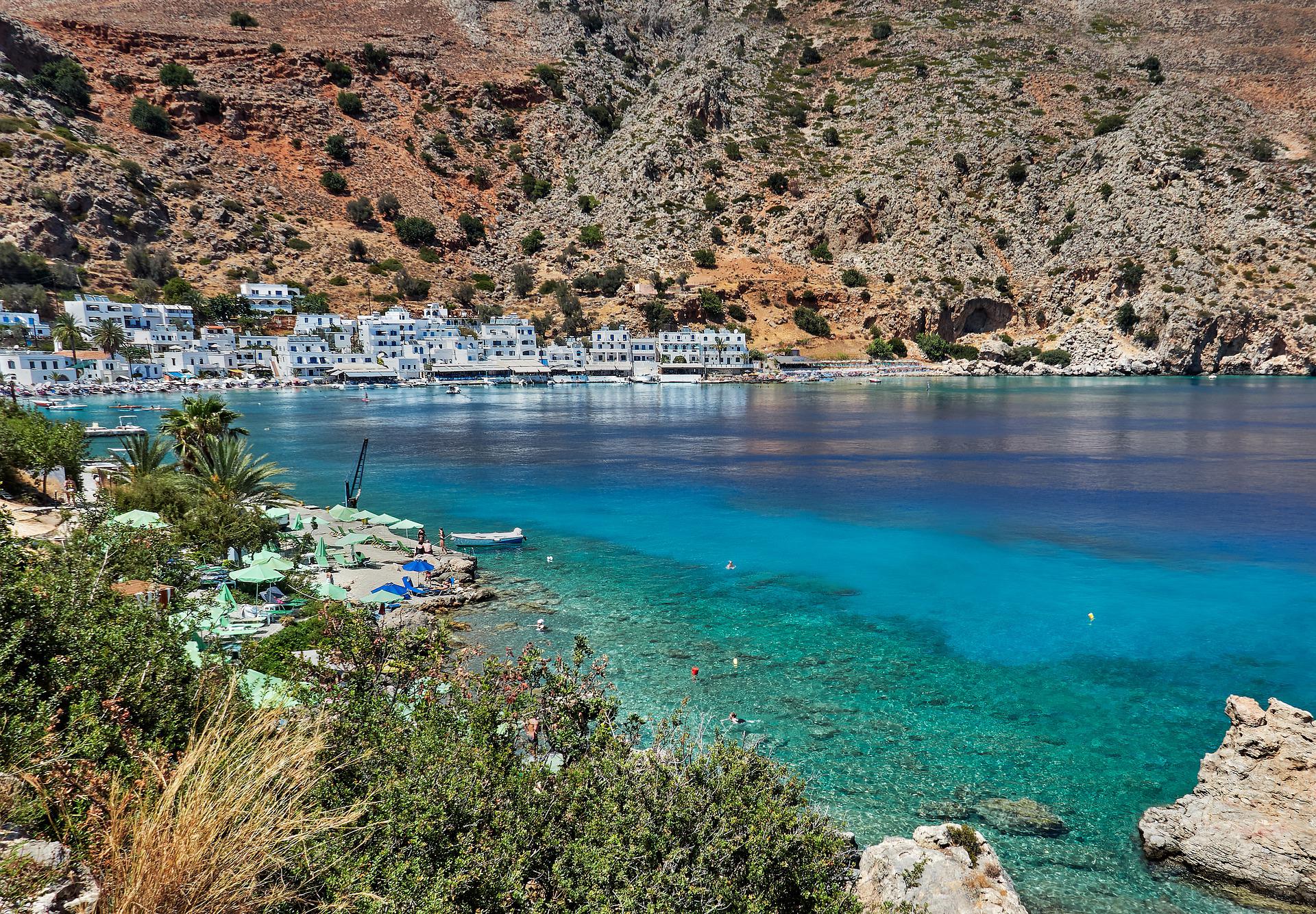 See glimmering blue waters and white-washed buildings in Loutro. One of the best hidden gems!
