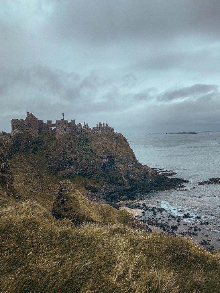 Castle ruins on the coast of Northern Ireland Standup Paddleboarding in Europe