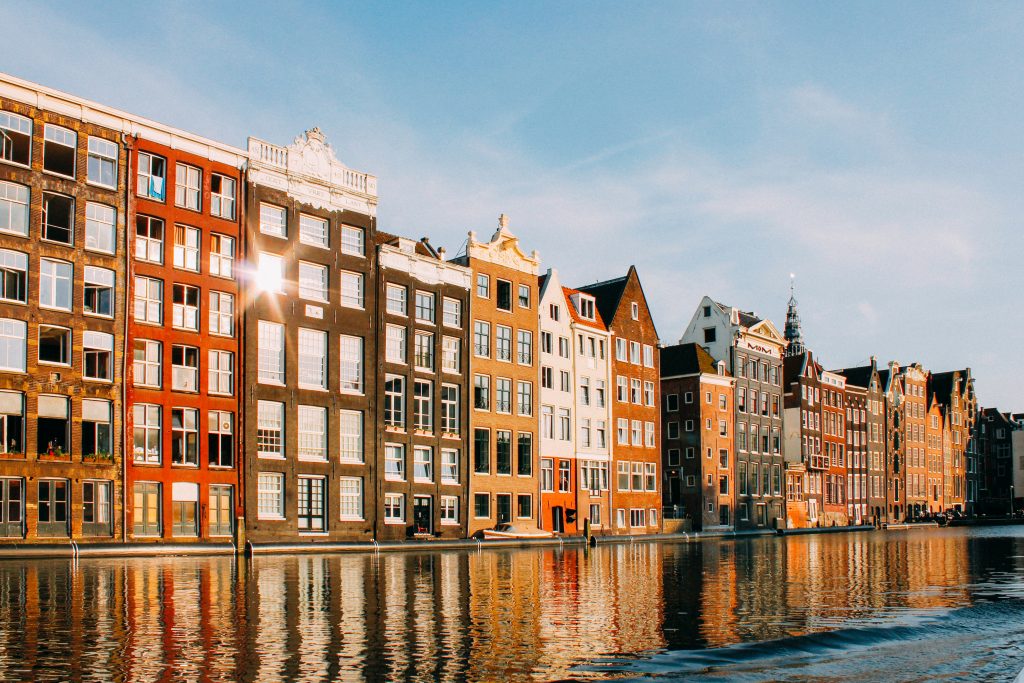 One of the best cities to live in for young professionals is Amsterdam in Netherlands.