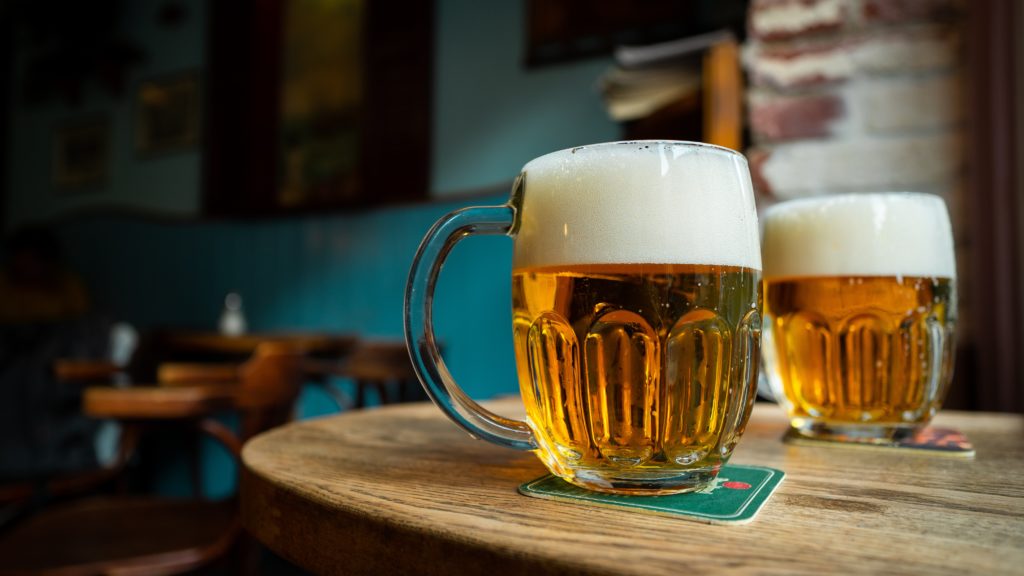 Two Pilsner beers on a table in Germany