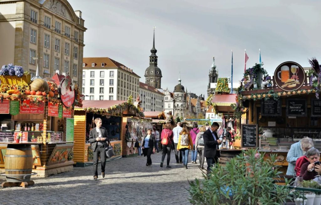 Market with food and drinks in the center Dresden travel destinations for students in germany
