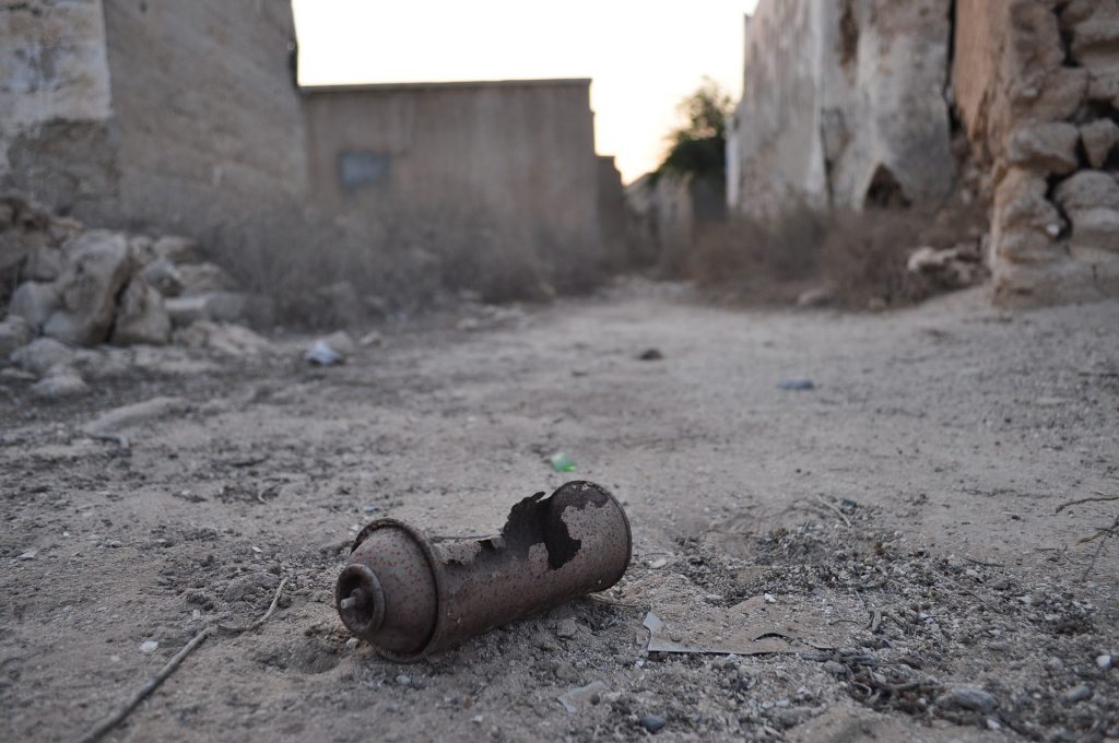 Jazirat Al Hamra one of the world's scariest ghost towns in United Arab Emirates with an old rustic spray can.