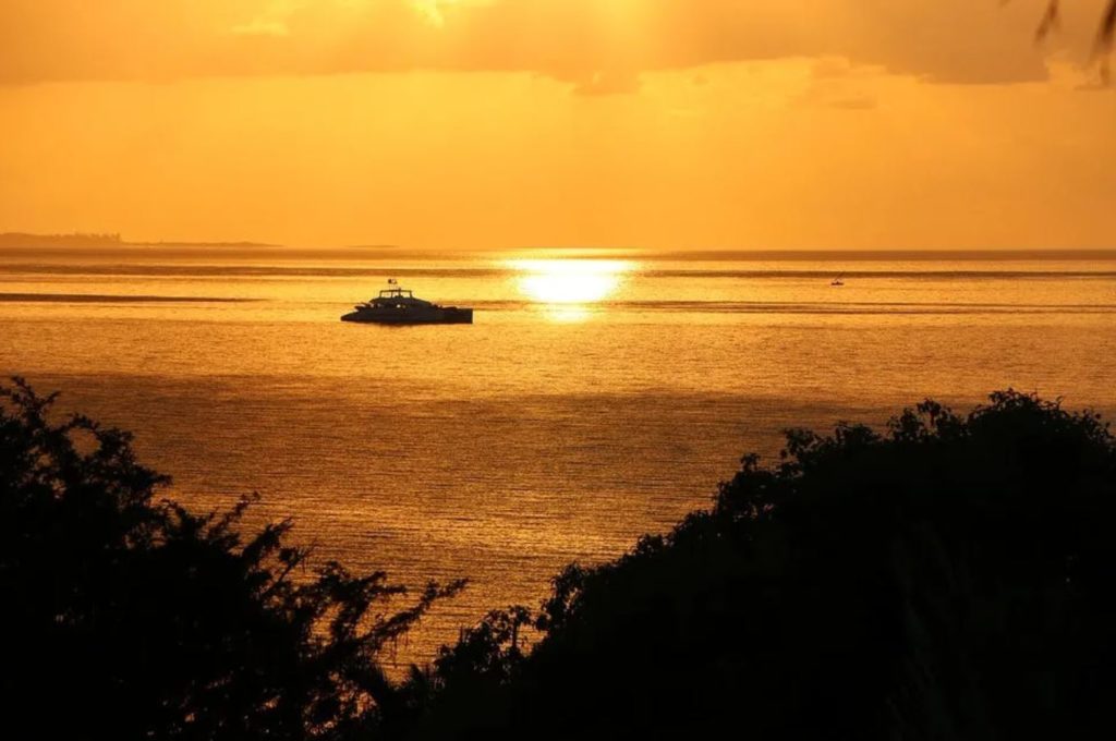 Sunset over the ocean in mozambique December Travel Destinations