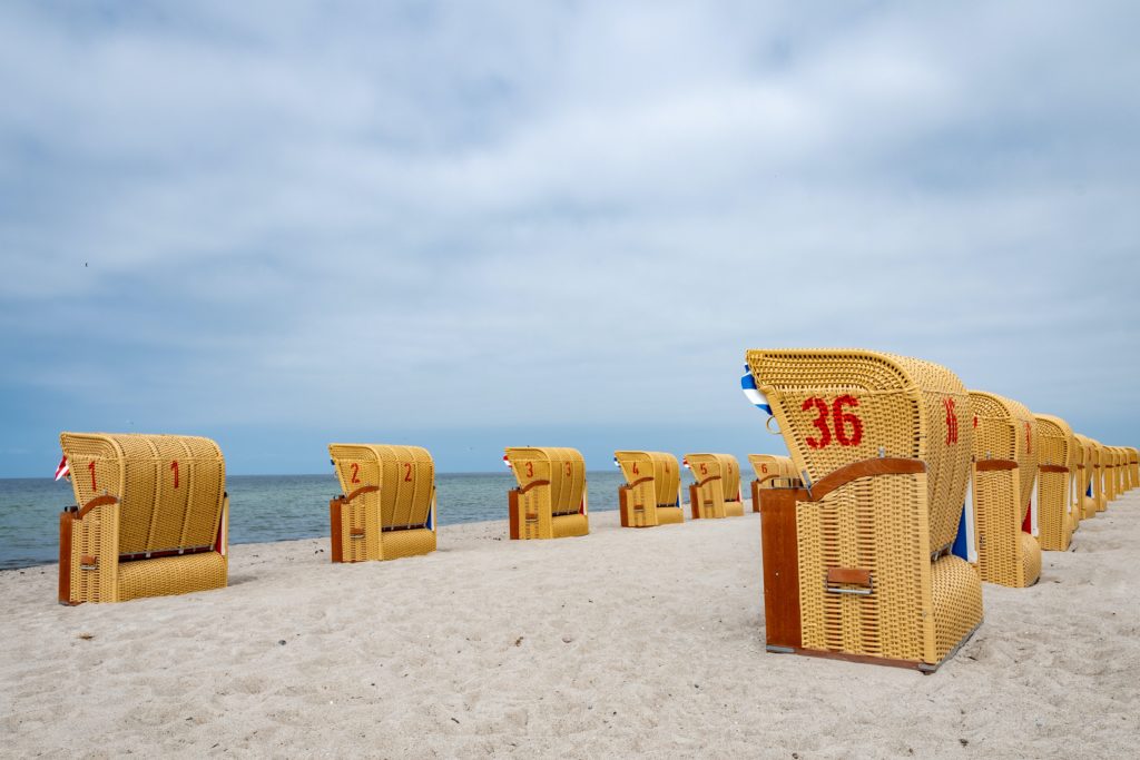 Beach chairs on the coast of the North Sea in Schleswig Holstein Destinations in Germany for Autumn 2023
